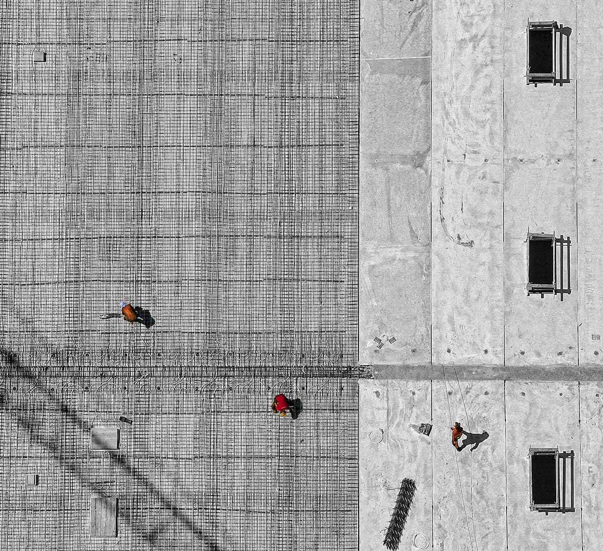 Curious Projects — aerial view of construction workers