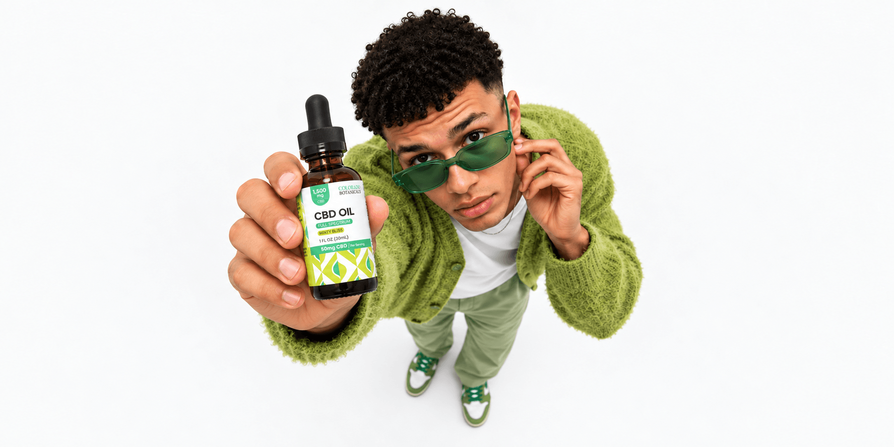 Colorado Botanicals CBD oil campaign with a model wearing green
