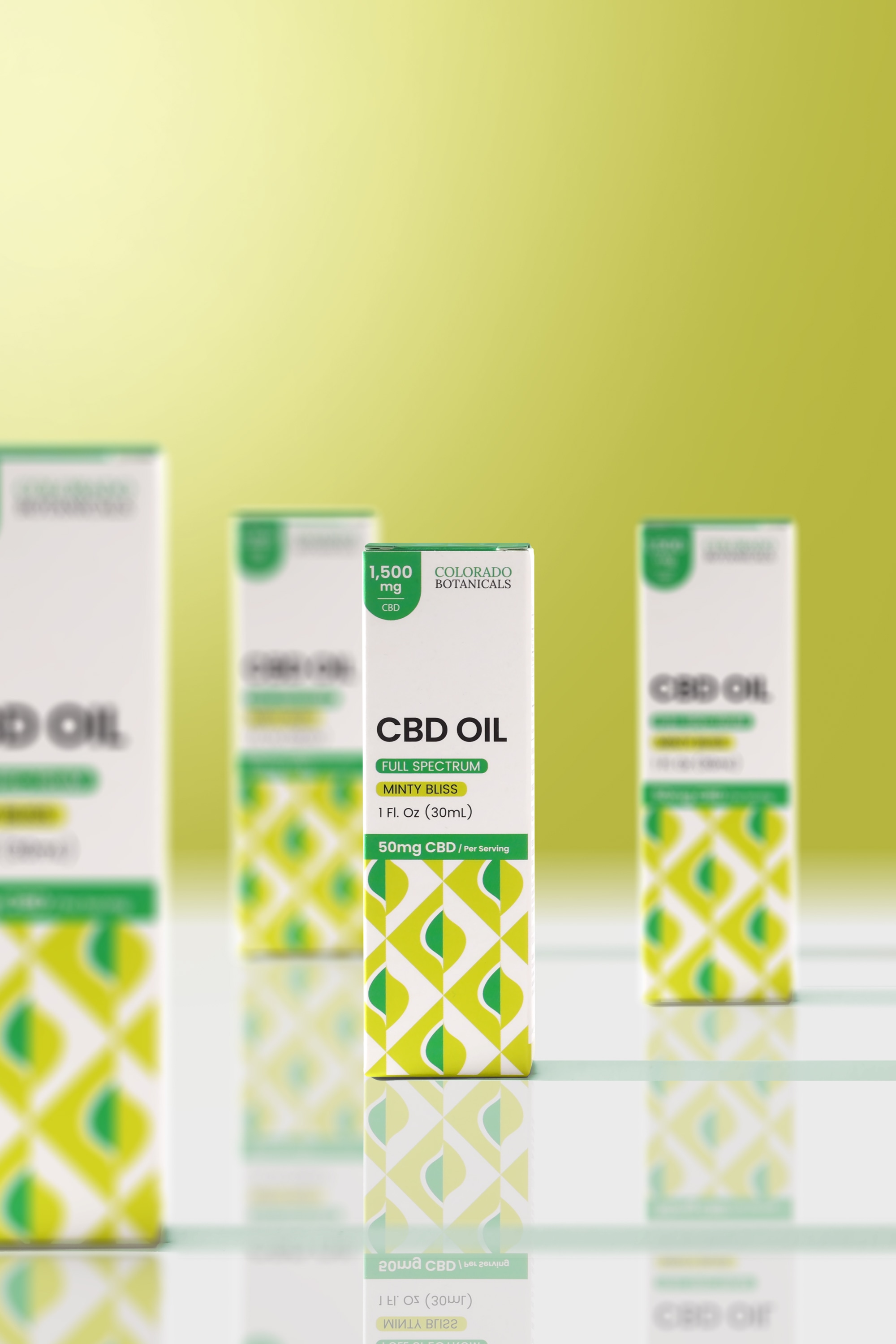 CBD oil packaging with green geometric patterns