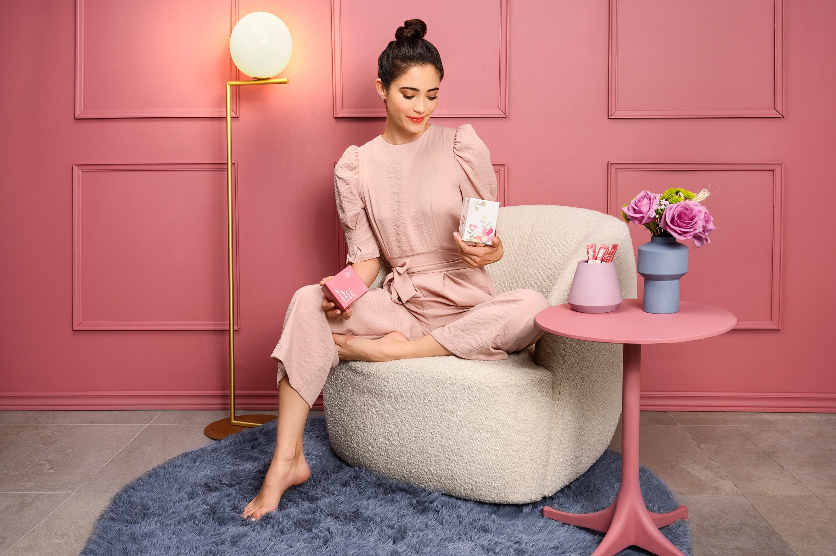 Cranberry lifestyle campaign in a pink room