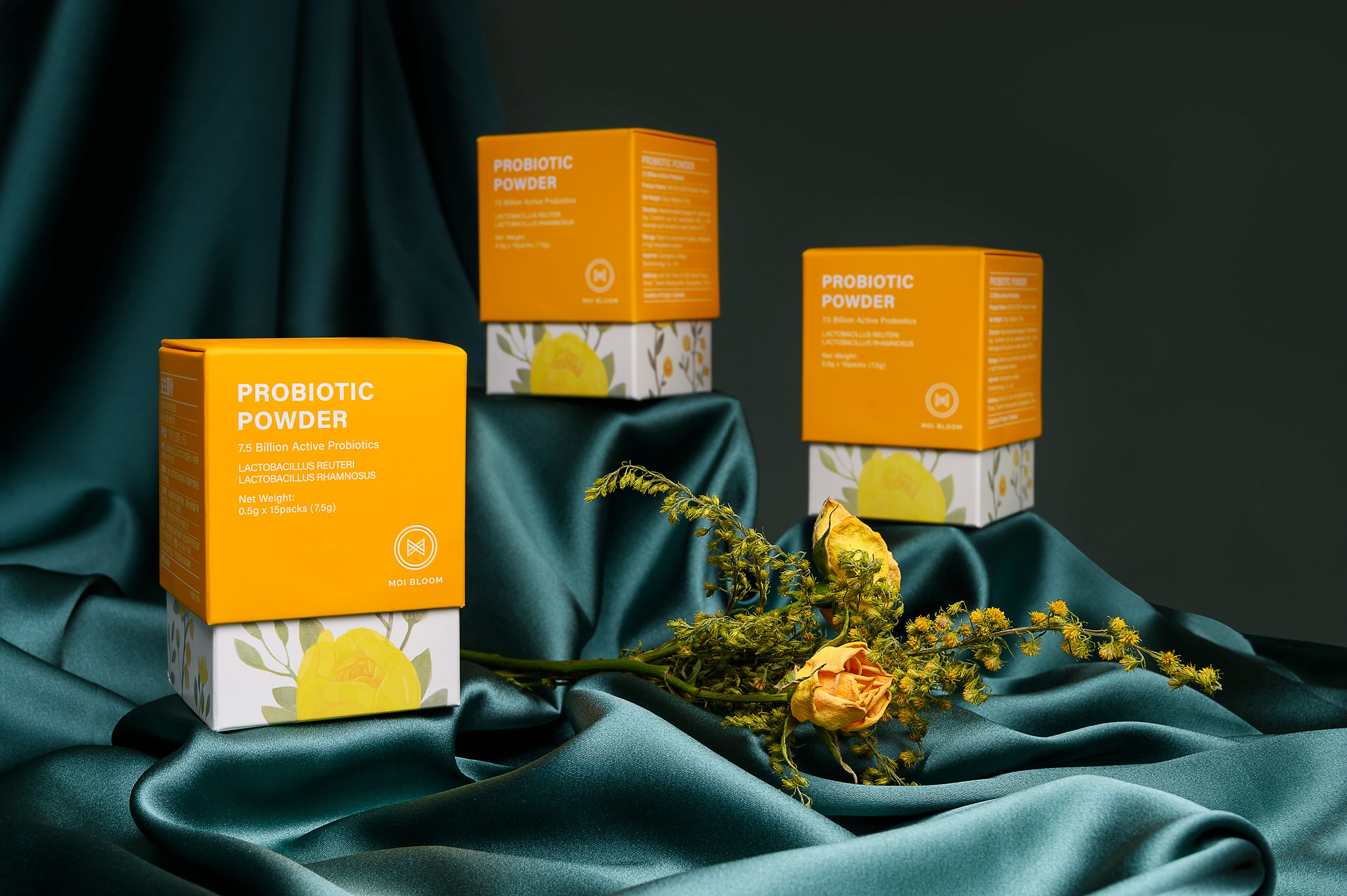 Probiotic product collection on teal fabric